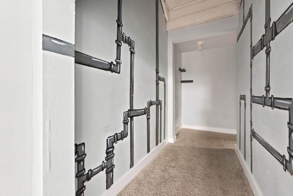 Play area under the stairs.