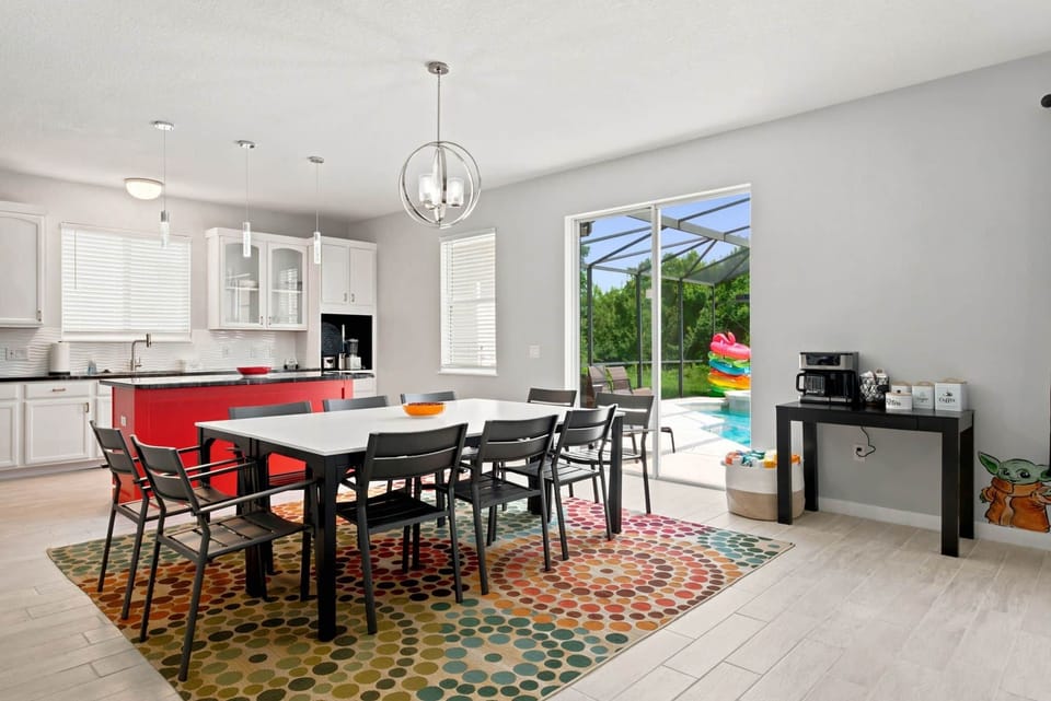 The dining area looks out to the pool.