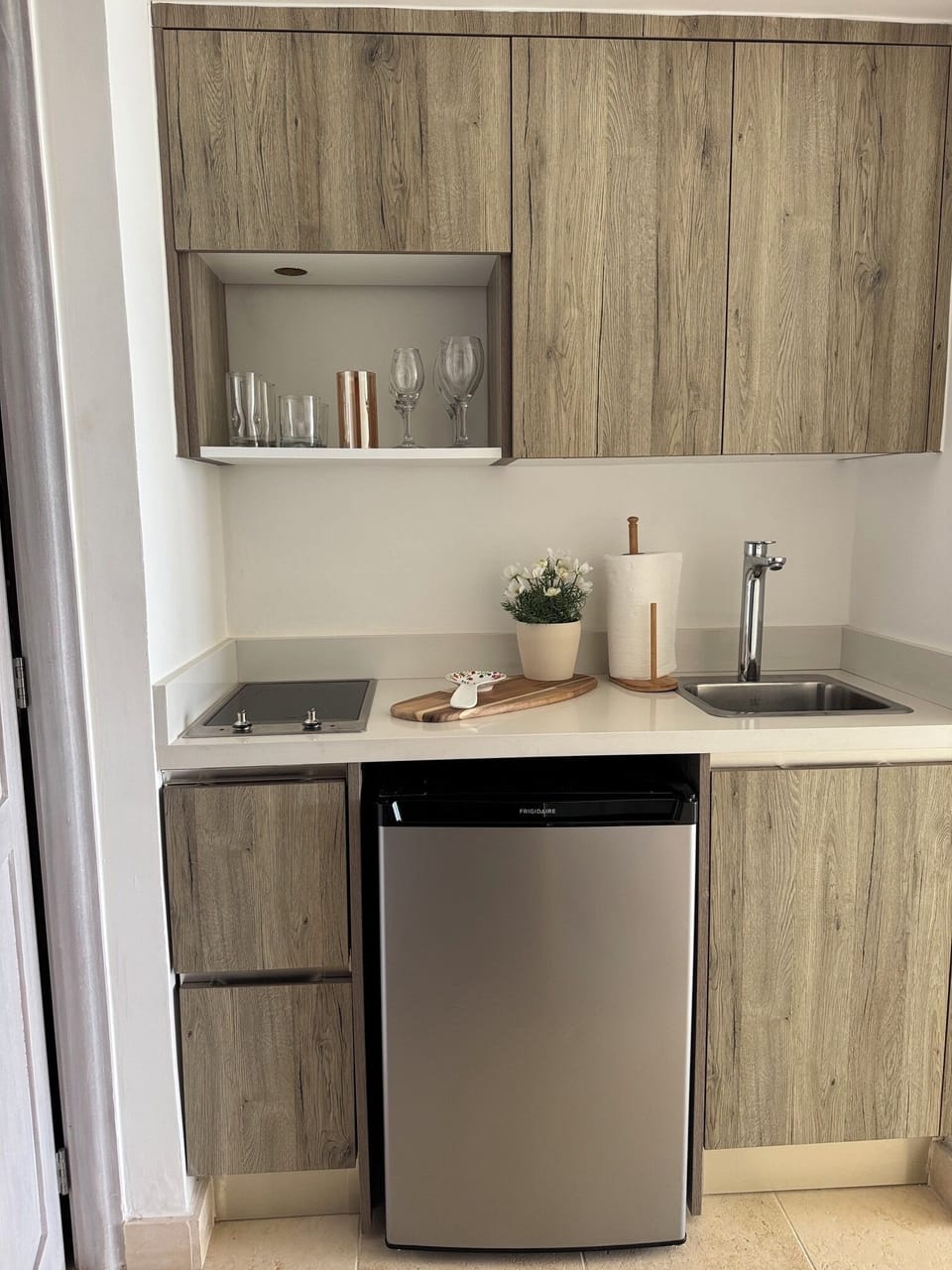 kitchenette with Keurig coffee maker and pods 