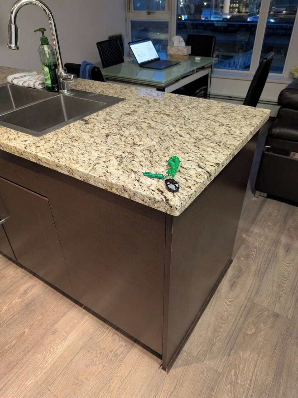 Large kitchen island offering additional preparation and serving space.