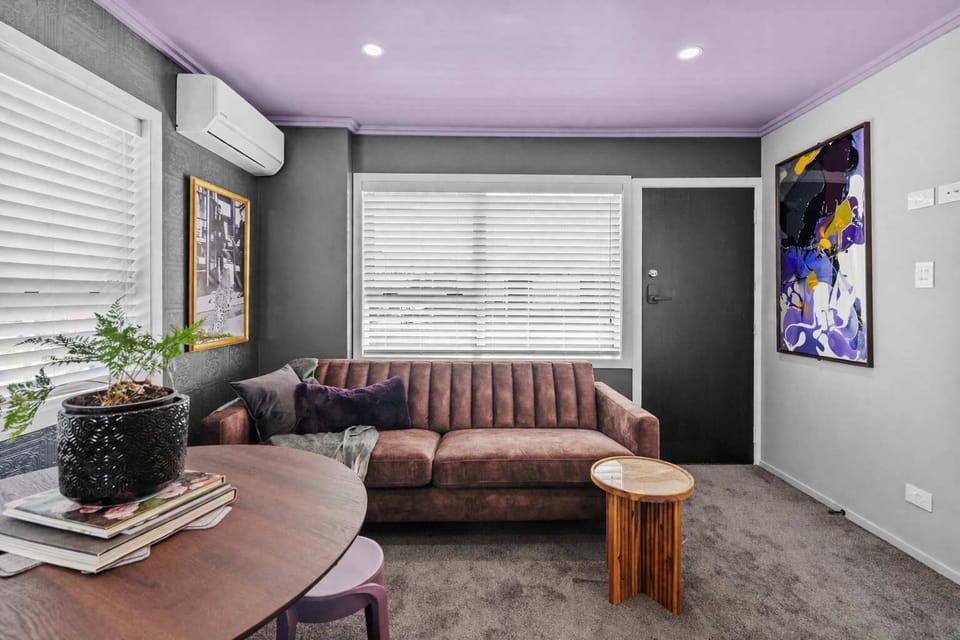 Spacious living room featuring an ultra-comfortable couch perfect for relaxing.