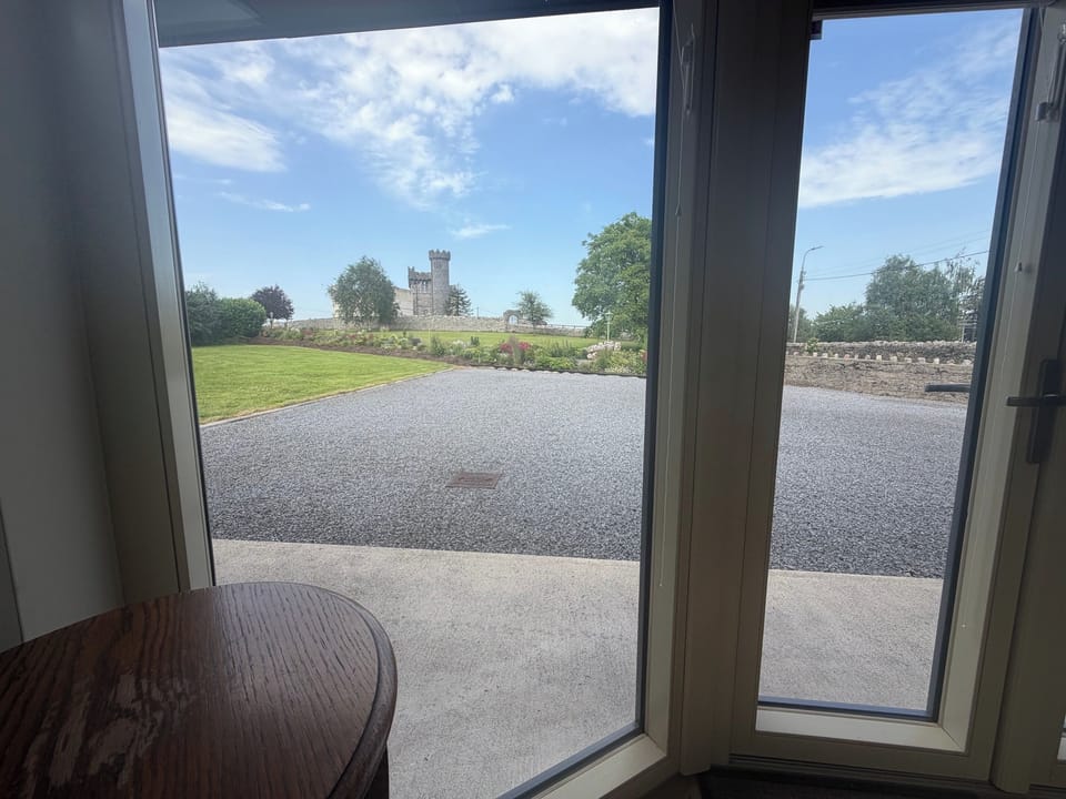 The inspiring garden, woodland and heritage views adjacent to the workspace in the living room.