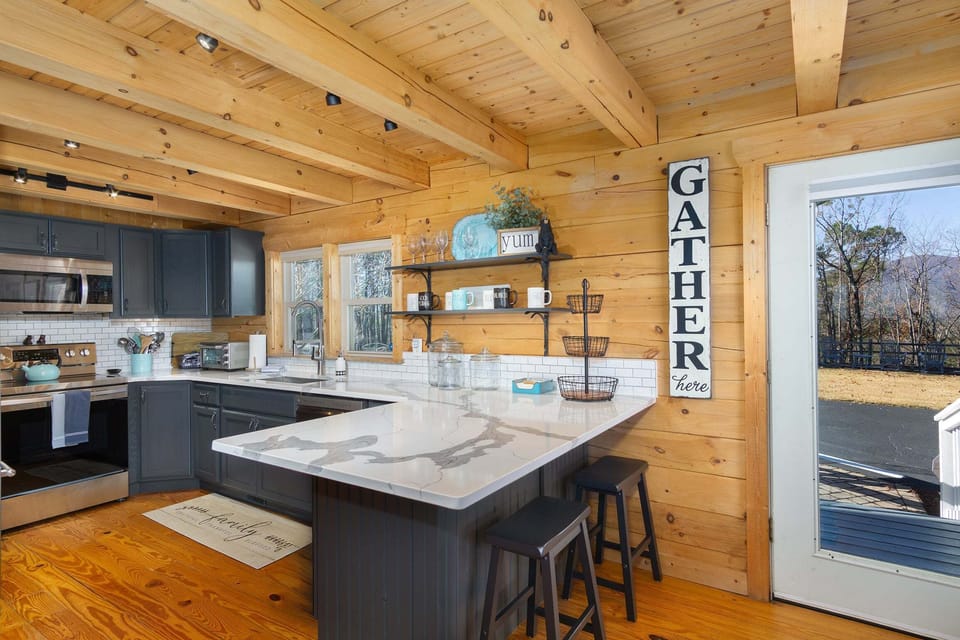 The main entrance leads into the kitchen/dining area.