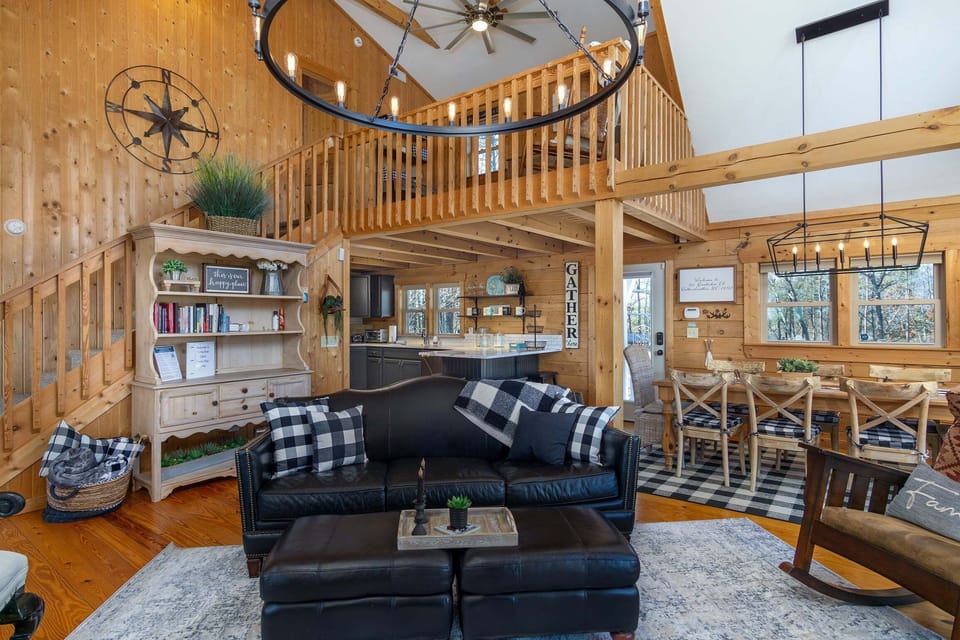 Open living, dining, and kitchen areas on the main level.