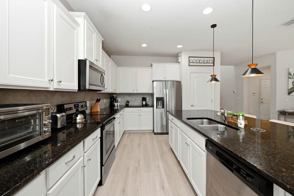 Kitchen: Sleek design meets functionality—whip up delicious meals in style!