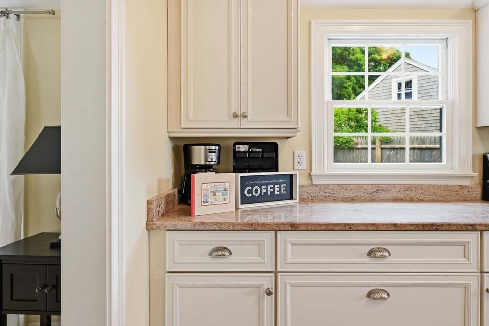 Coffee station with a coffee pot, perfect for brewing your morning coffee.