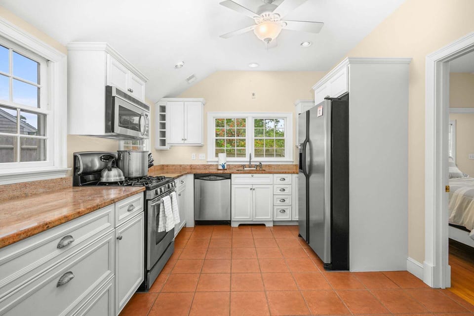 Spacious kitchen with ample counter space, modern appliances, and plenty of room for cooking, gathering, and entertaining.