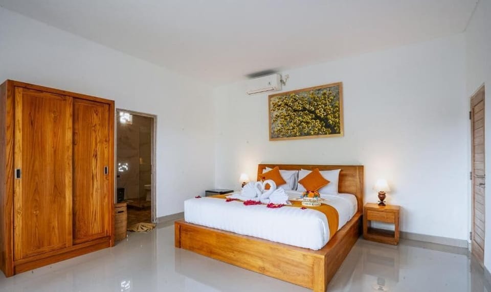Deluxe Double Room, Balcony, Pool View | In-room safe, blackout drapes, soundproofing