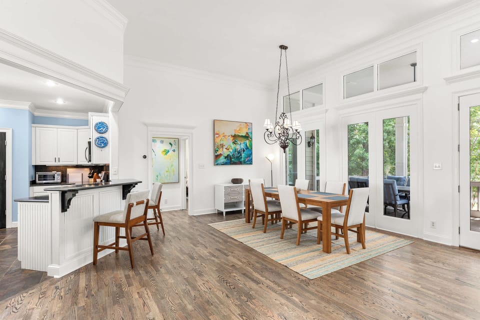 Dining table with seating for 6 and an additional 2 bar stools