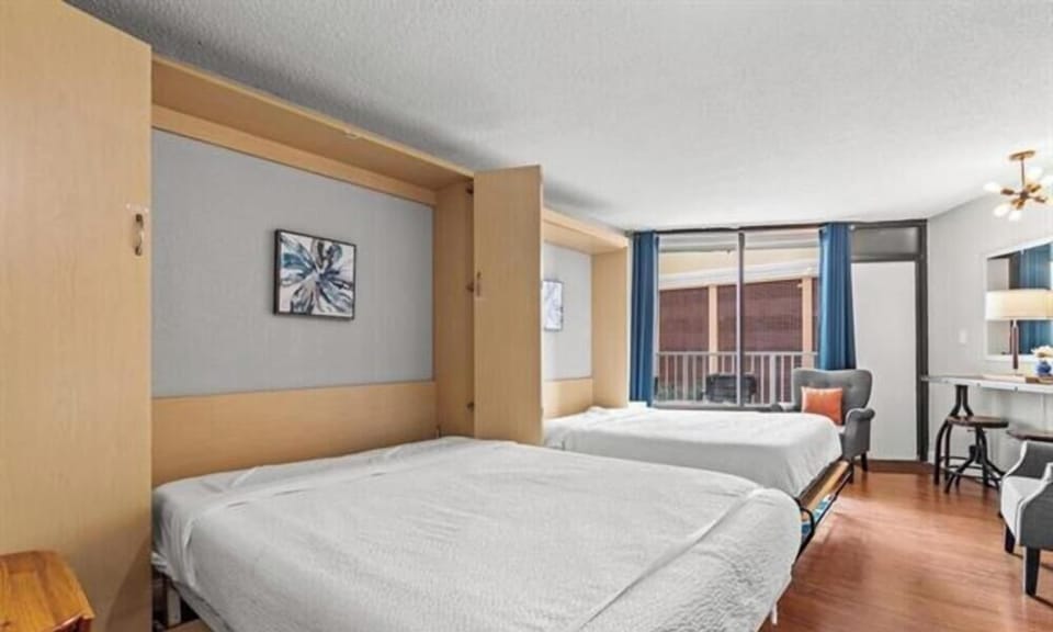 Exclusive Studio, Multiple Beds, Ocean View | In-room safe, iron/ironing board, WiFi (free), individually decorated