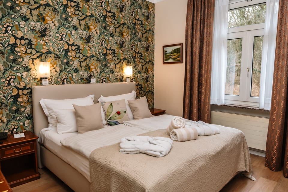 Junior Suite | Pillowtop beds, minibar, in-room safe, individually decorated