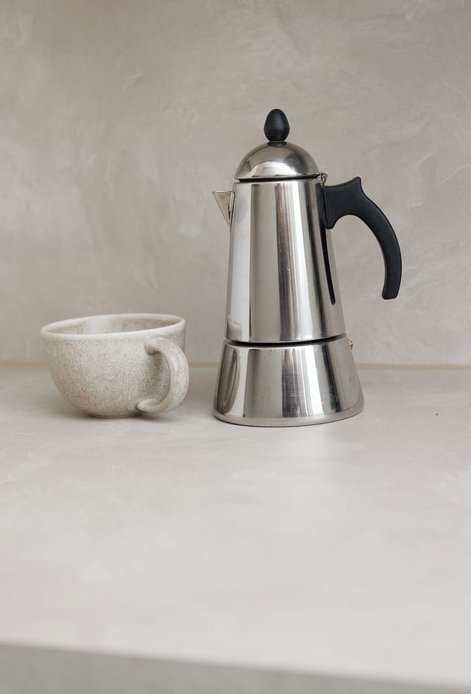 Minimalist coffee setup with espresso maker for easy, cozy mornings