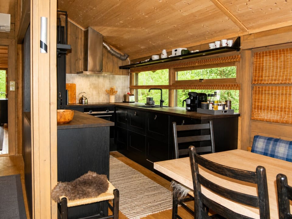 Spacious kitchen with dining table