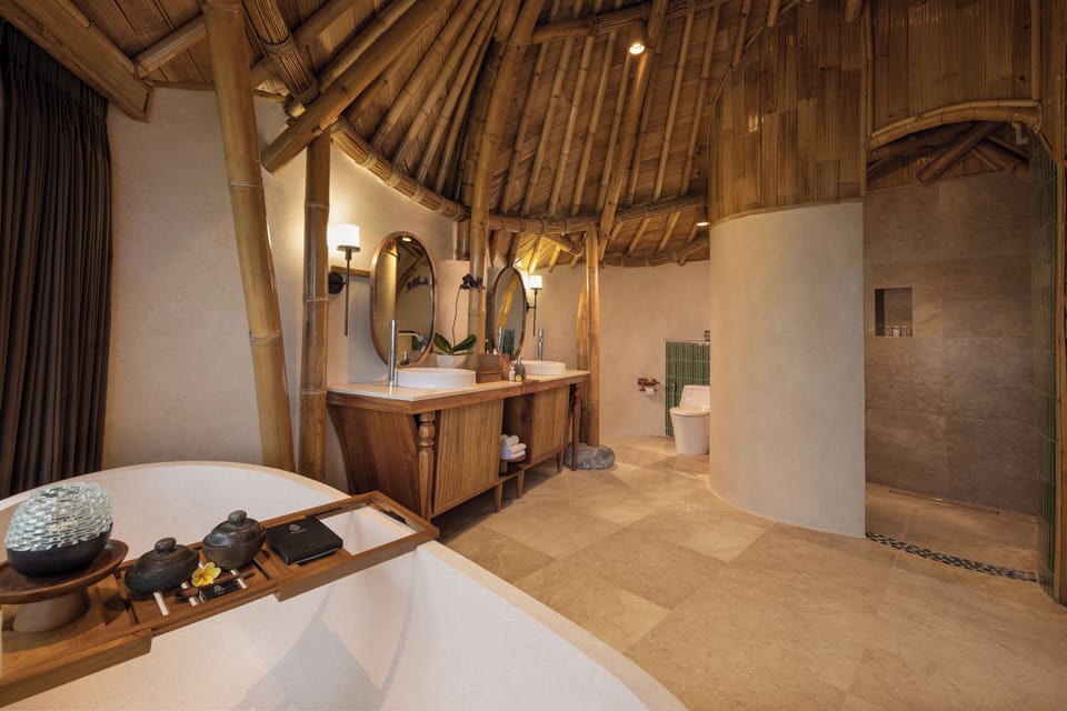 Premiere Pool Villa | Bathroom | Separate tub and shower, free toiletries, hair dryer, slippers