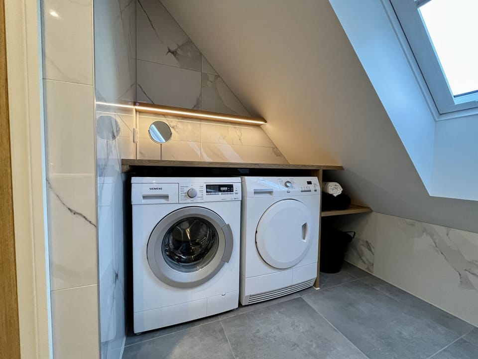 Washer and dryer in the bathroom.
