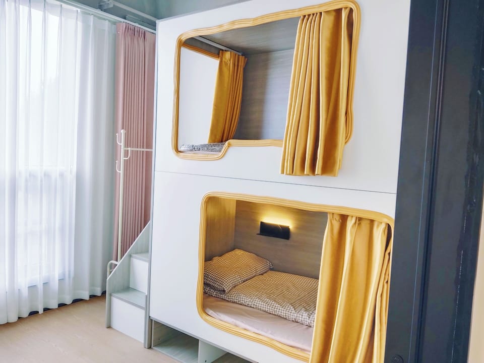 Economy Shared Dormitory, Women only | Desk, laptop workspace, blackout drapes, iron/ironing board
