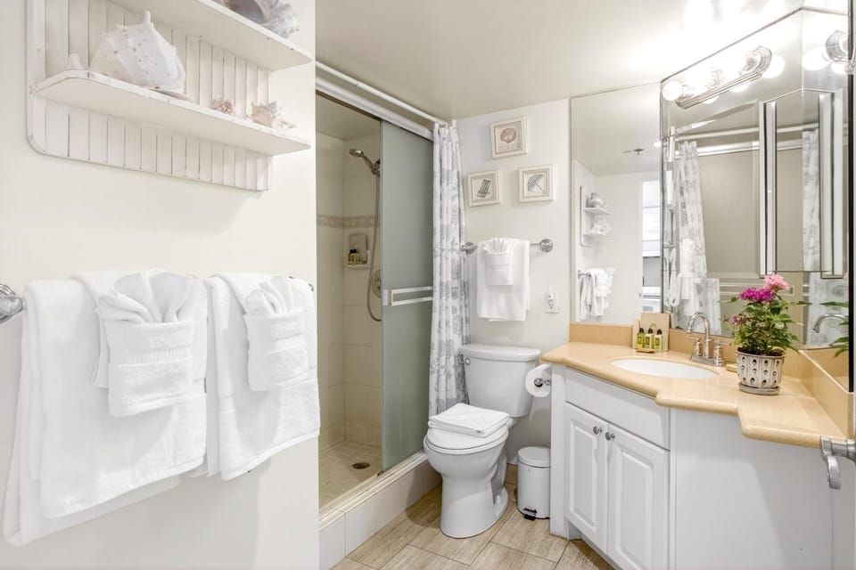 The pristine bathroom, complete with fresh towels, luxury amenities, and plenty of space to get ready for your day on the town. 