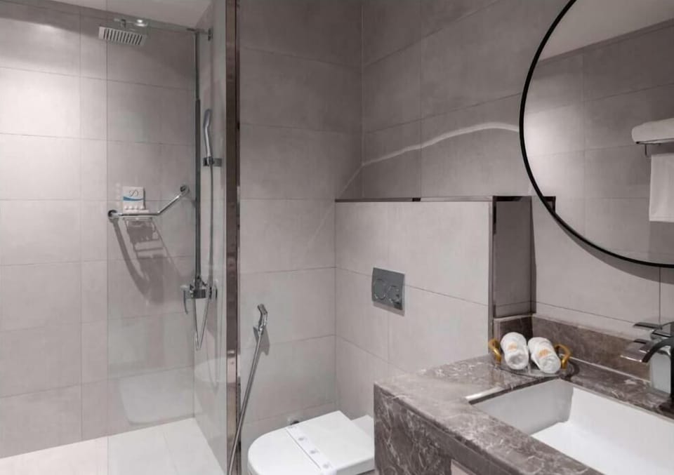 Shower, free toiletries, hair dryer, slippers