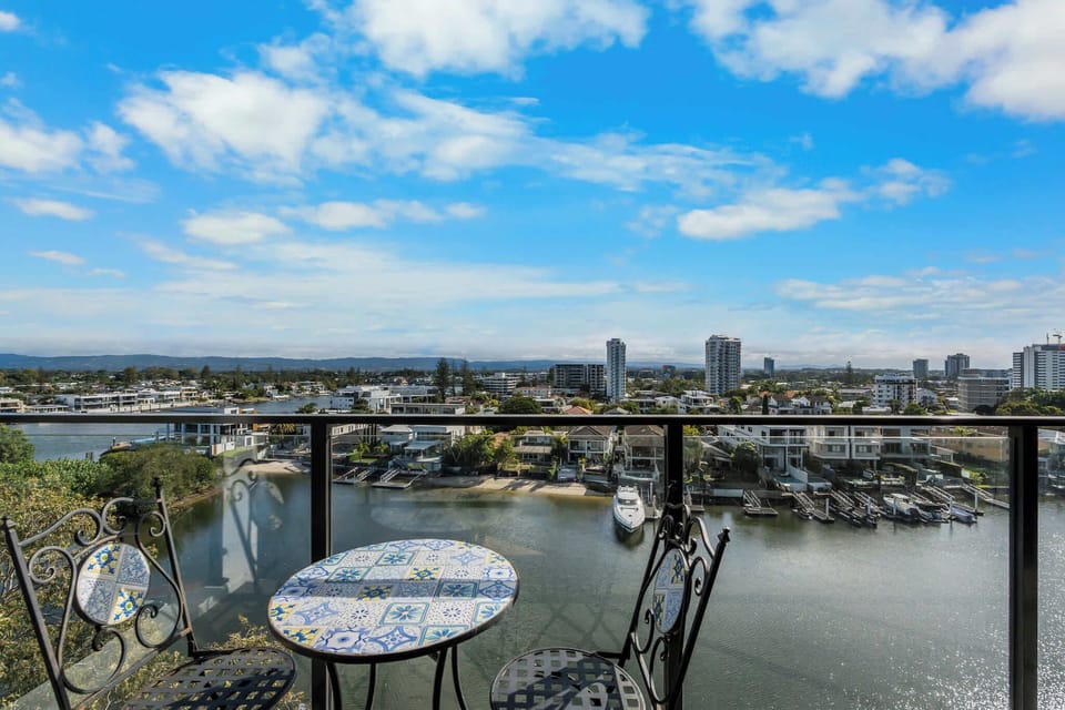 Private balcony with stunning water views and outdoor dining.