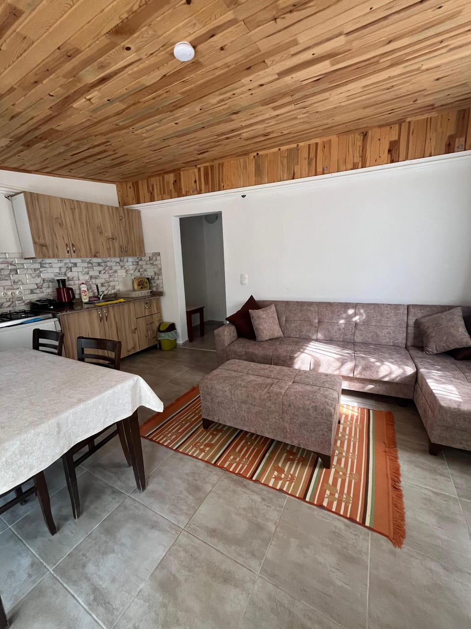 Family Quadruple Room, Balcony | Living area