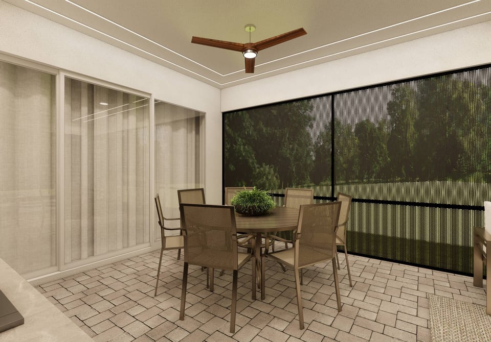 Experience our inviting outdoor dining area with a round table and cozy chairs, perfect for enjoying meals in nature. The stone-paved floor and sliding glass doors offer a seamless connection to the beautiful views all around.