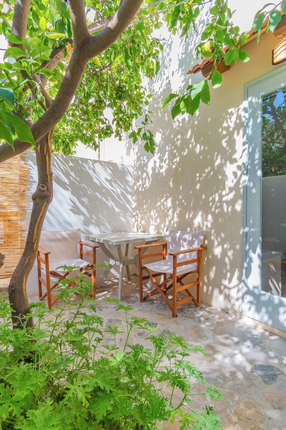 Artemis: Peaceful patio area, perfect for a quiet morning coffee.