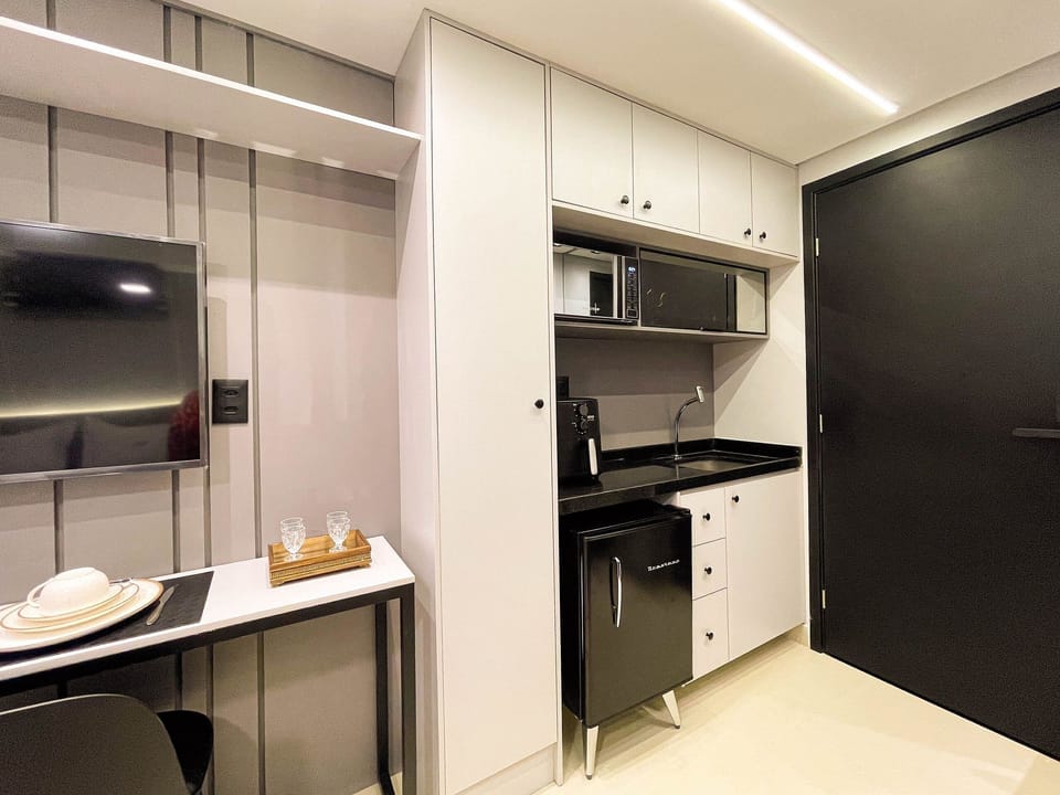 Apartment | Private kitchen | Mini-fridge, microwave, stovetop, cookware/dishes/utensils