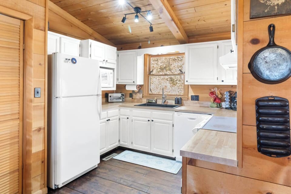 Fully equipped kitchen with modern appliances, ample counter space, and everything you need for home cooked meals. Perfect for extended stays, family dinners, or preparing breakfast before exploring Mars Hill and Asheville.