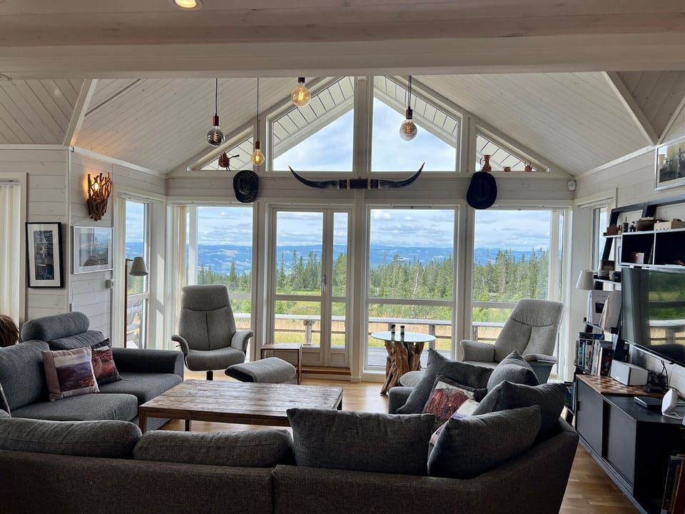 The living room is furnished to enjoy the views!