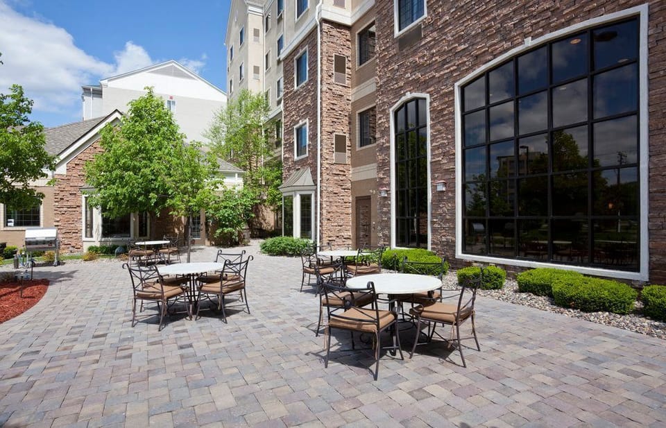 Open-air patio with table seating — grab a coffee after the morning breakfast buffet