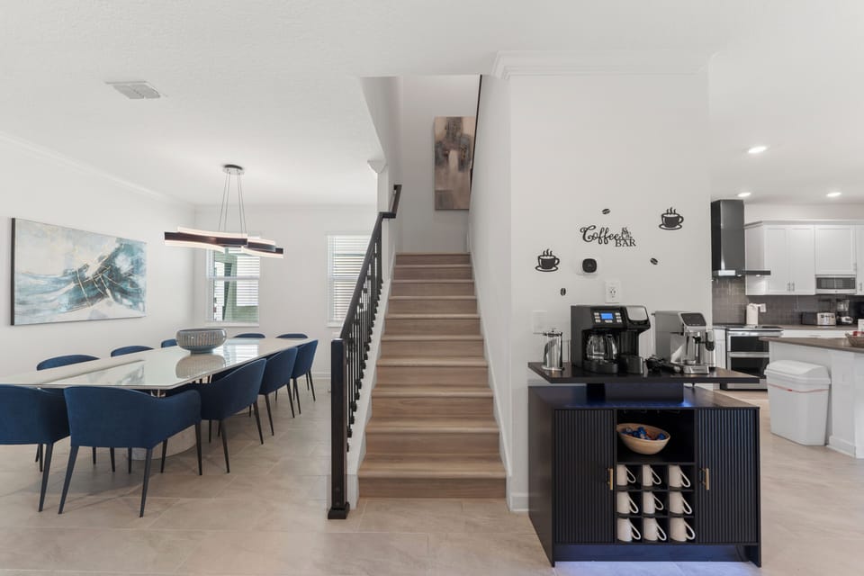 Bright open dining area with stylish coffee bar and modern design
