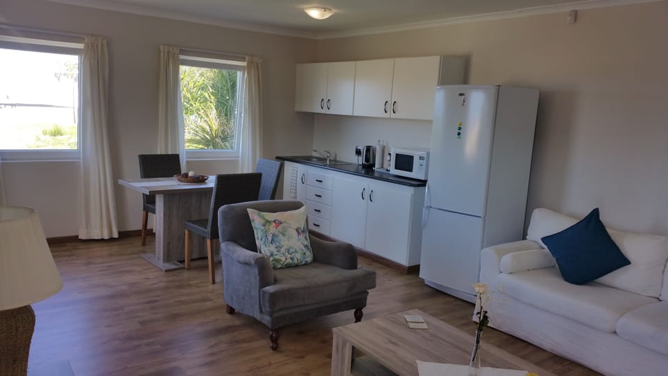 One-Bedroom Apartment With Sea View | Private kitchen | Coffee/tea maker, fridge, microwave, electric kettle