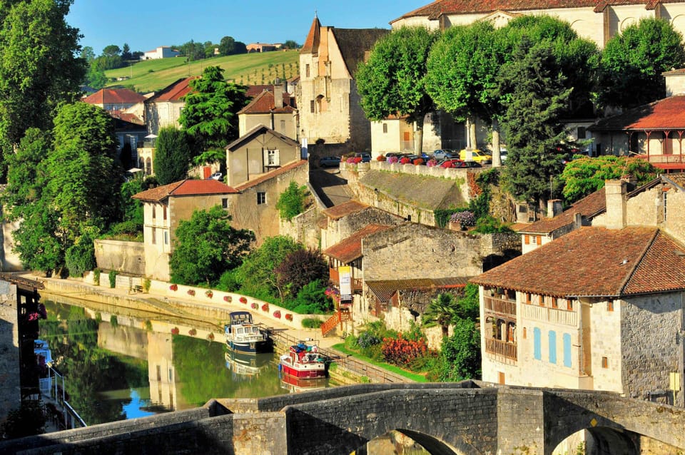 Evening light on the old stone facades — Nérac's historic streets are yours to explore after dark.