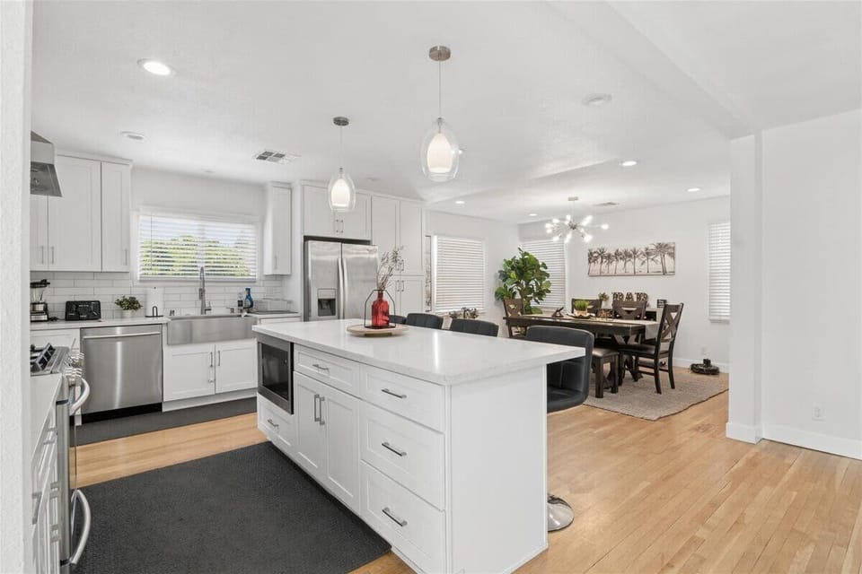 Open modern beautiful kitchen with everything you need for cooking a great meal.