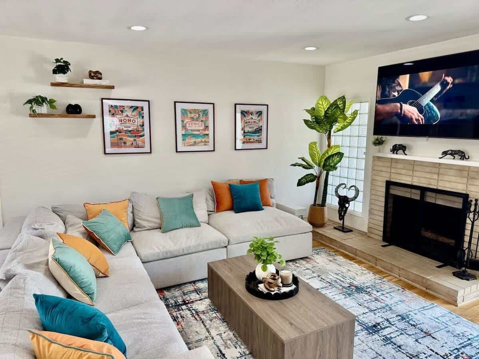 The large comfortable living room with the great sofa for relaxing and hanging out and watching TV