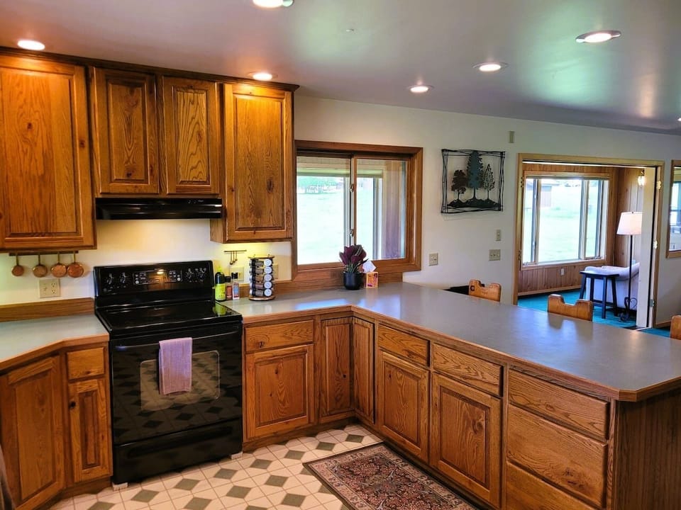 Spacious kitchen outfitted with cookware