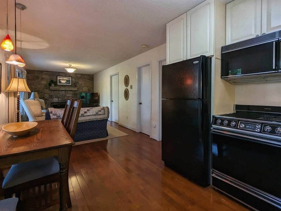 View from Kitchen to Den on Lower Level