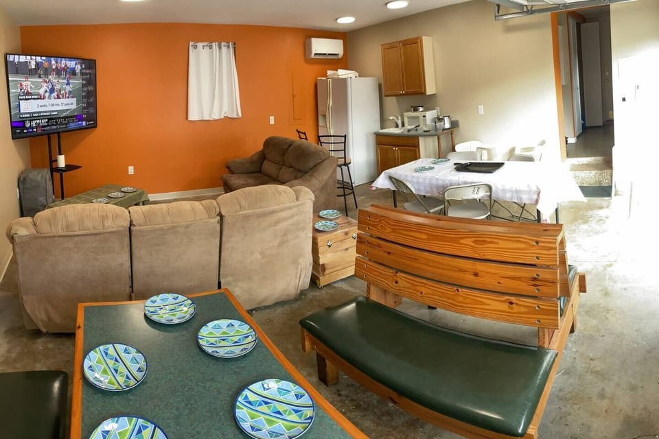 Event space. Large screen TV (Do not move the TV), couch, love seat, table with bench seating, bar with sink, refrigerator, bar stools, microwave, in-room temperature control. Refrigerator is not kept on; if you need it, you will need to plug it in.
