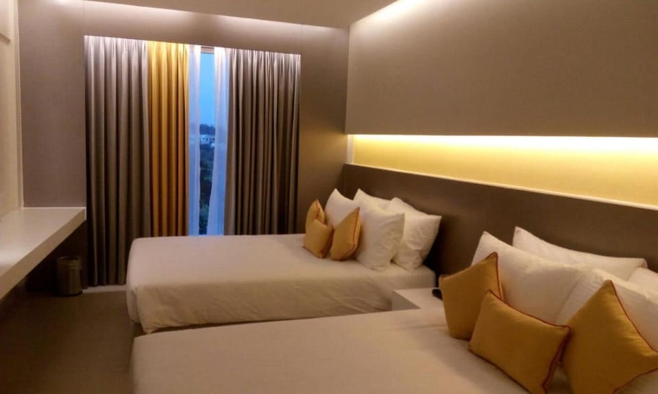 Deluxe Double or Twin Room, 1 Bedroom | Minibar, desk, soundproofing, rollaway beds