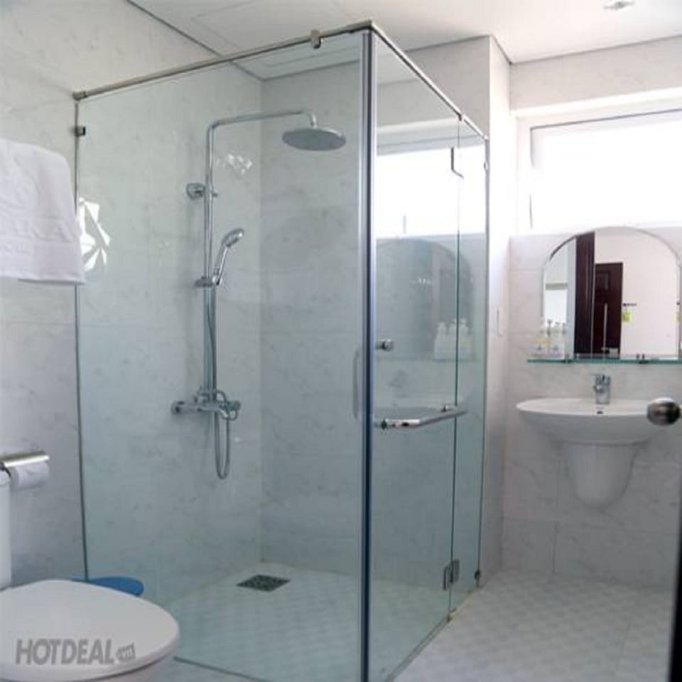 Shower, free toiletries, hair dryer, slippers