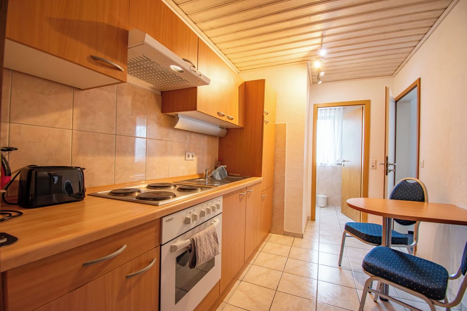 Superior Triple Room, Multiple Beds | Private kitchen