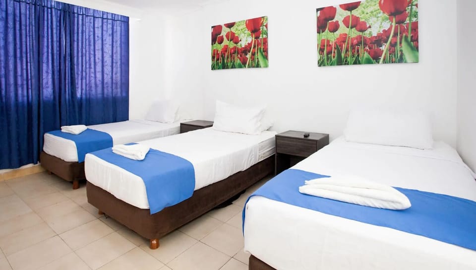 Standard Triple Room, Balcony, City View | In-room safe, iron/ironing board (on request), WiFi (free)