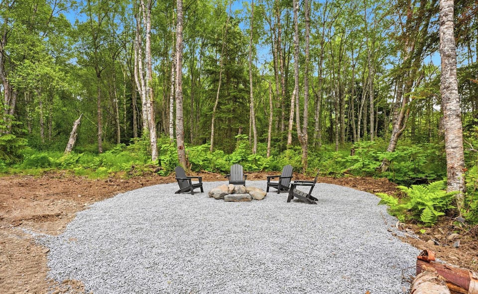 Fire Pit with stream behind it