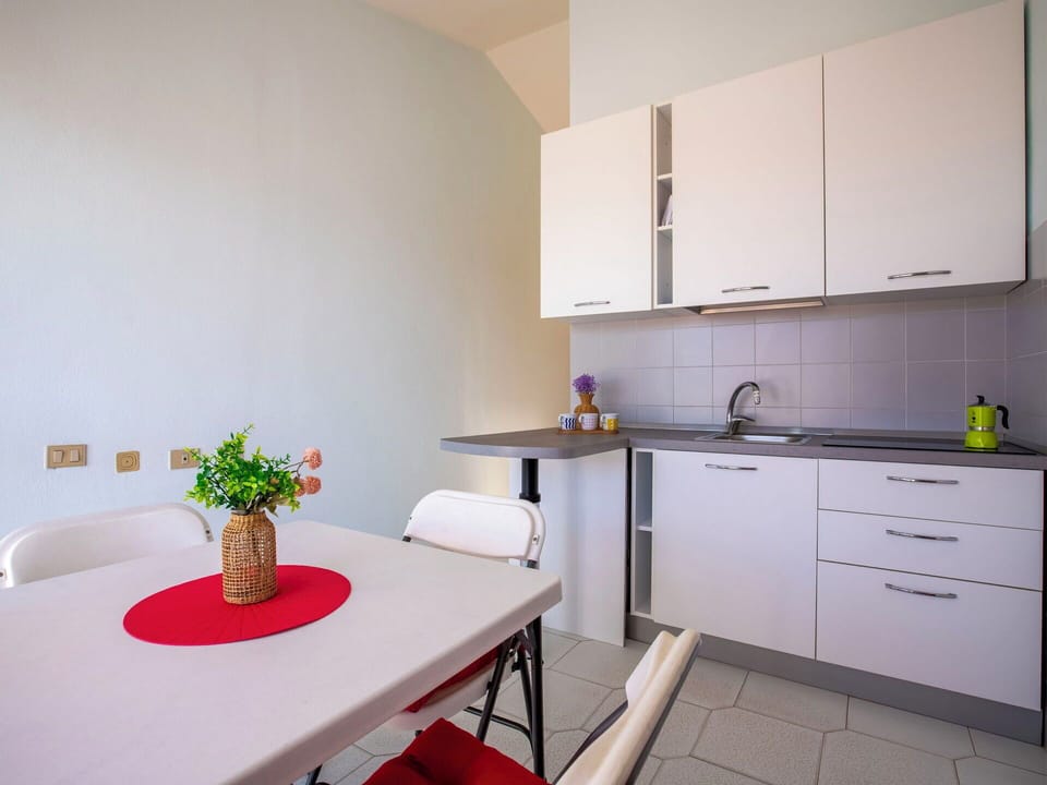 Furniture, Interior Design, Flooring, Floor, Kitchen, Room, Chair, Kitchen & Dining Room Table, Ceiling, Kitchen Appliance