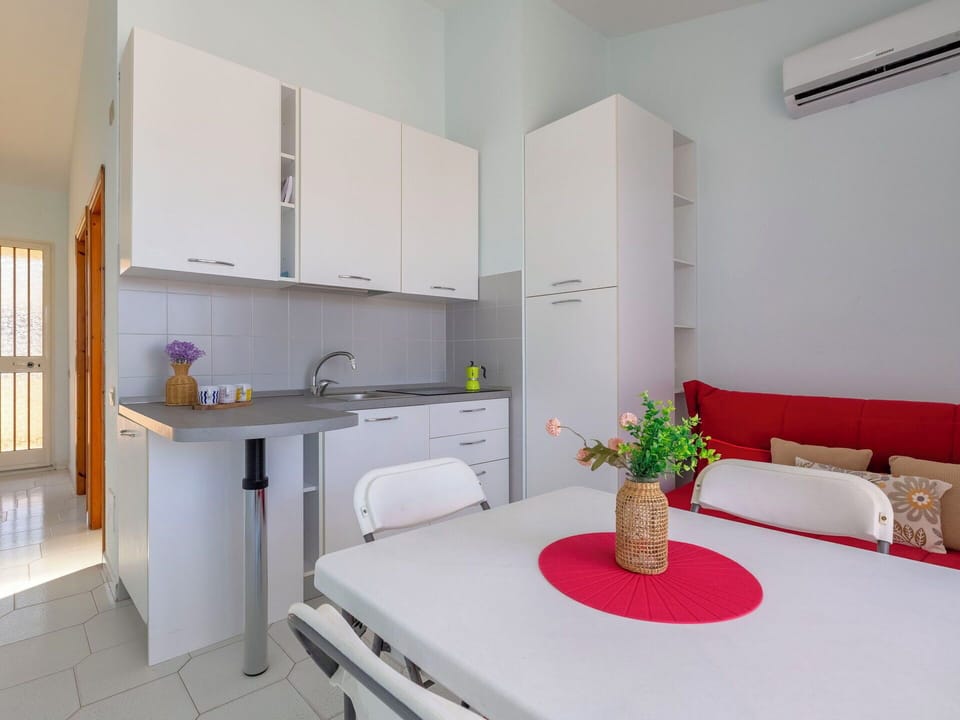 Furniture, Interior Design, Flooring, Floor, Room, Apartment, Home, Chair, Cabinetry, Ceiling