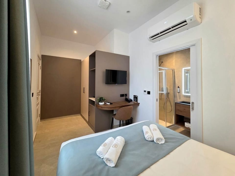 Deluxe Double Room, Courtyard View (Suite 102) | Desk, laptop workspace, blackout drapes, iron/ironing board (on request)