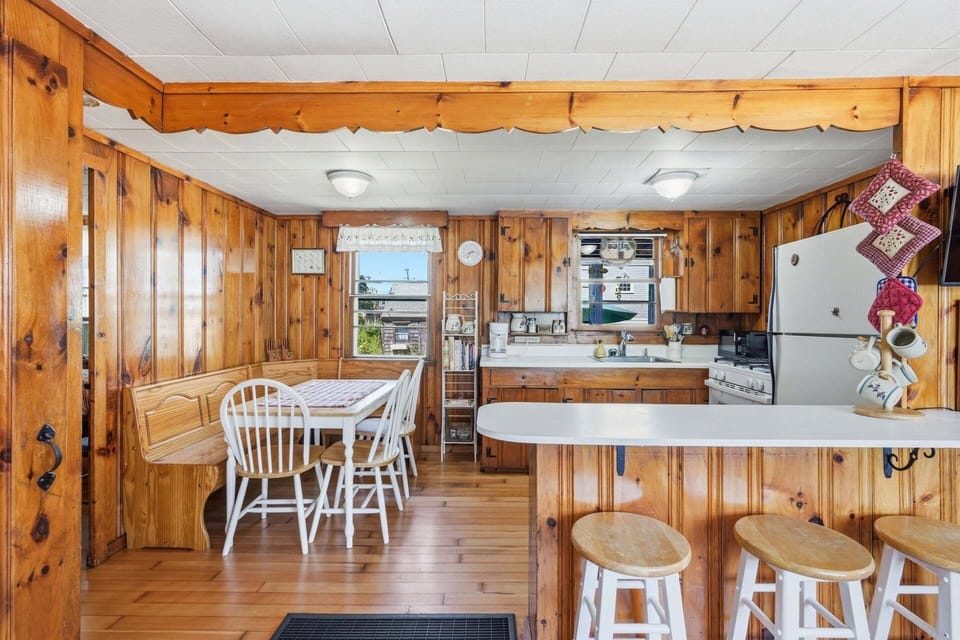 Enjoy easy conversation and meals with this open kitchen and dining layout.