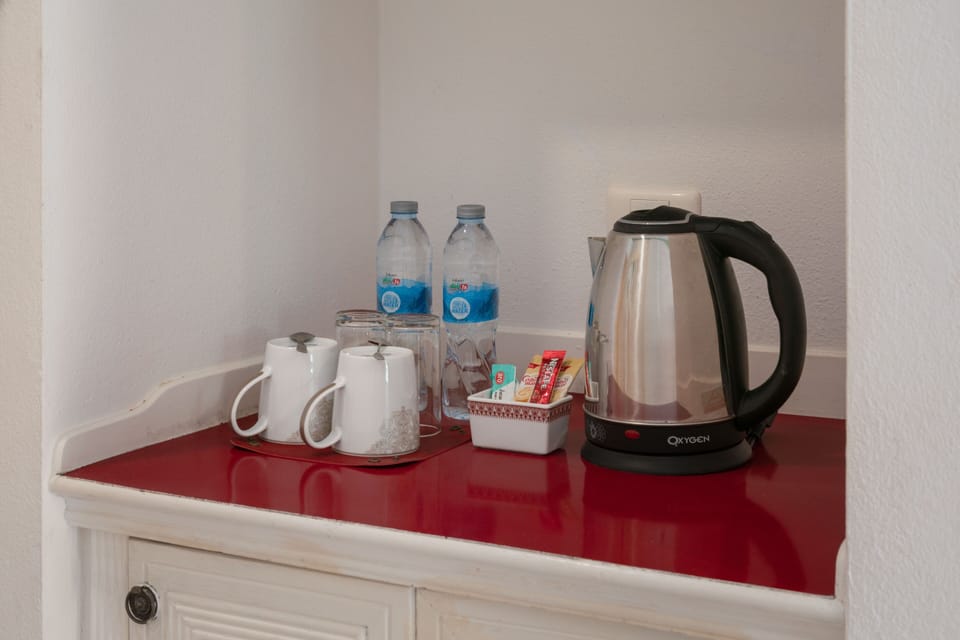 Deluxe Double Room, Pool View | In-room safe, WiFi (free), bed sheets