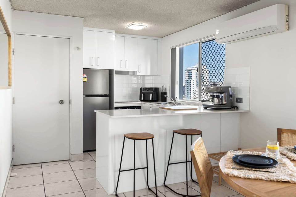 Fully equipped kitchen with quality appliances and generous bench space
