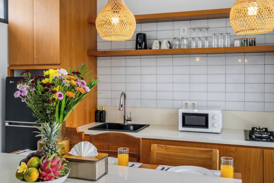 Standard Villa, Pool View | Private kitchen | Fridge, microwave, stovetop, dining table